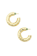 Gold textured hoop earrings on a white background