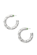 Silver textured hoop earrings on a white background