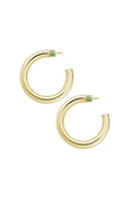 Gold hoop earrings with green accents on a white background
