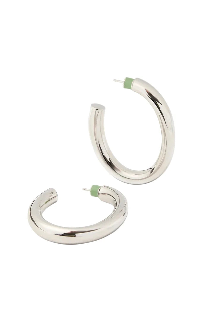 Pair of silver hoop earrings on a white background