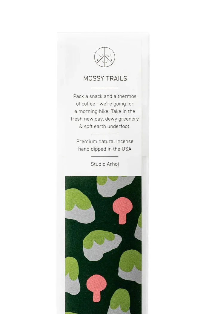 Mossy Trails incense packaging with green and pink nature designs on a white background