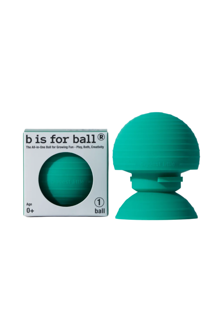 Green ball-shaped toy with packaging labeled 'b is for ball' on a white background