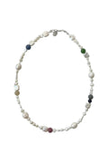 Pearl necklace with agate accents on a white background