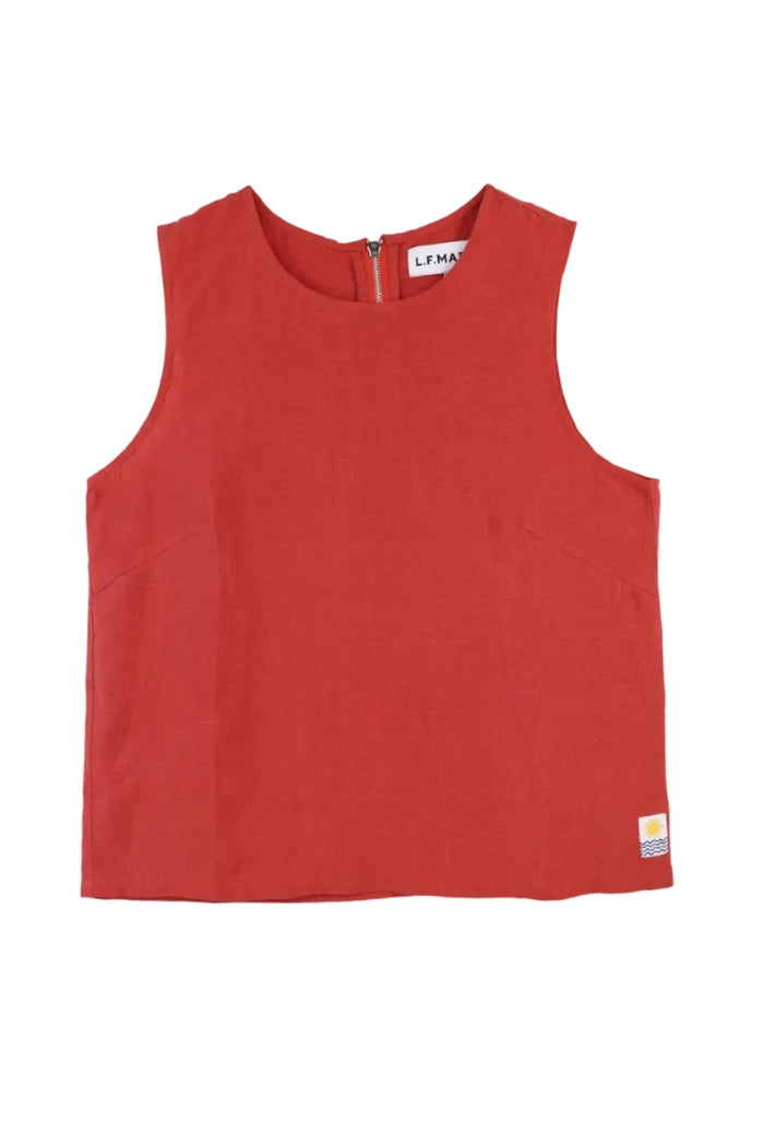 Red sleeveless shirt with brand logo tag on a white background
