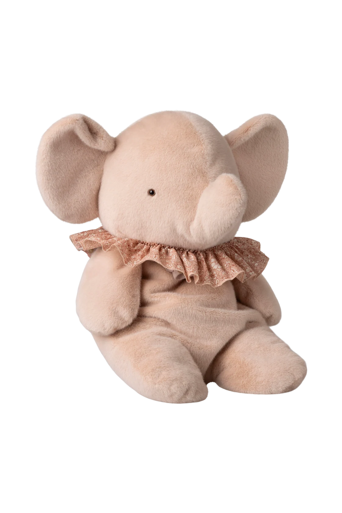 A plush elephant toy in a soft blush pink color, wearing a matching ruffled lace collar, set against a plain white background.