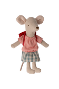 Stuffed mouse toy wearing a red checkered shirt and blue plaid skirt on a white background