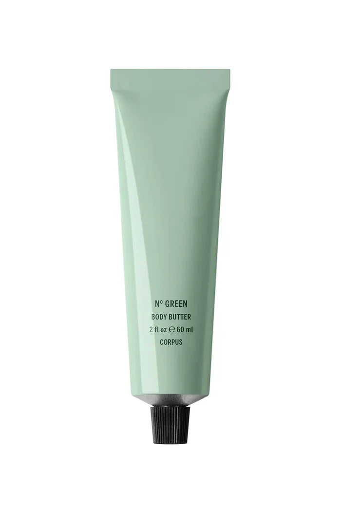 Green body butter tube on a light green background