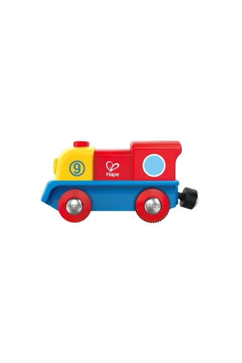 Colorful toy train engine with 'Hape' branding on a white background