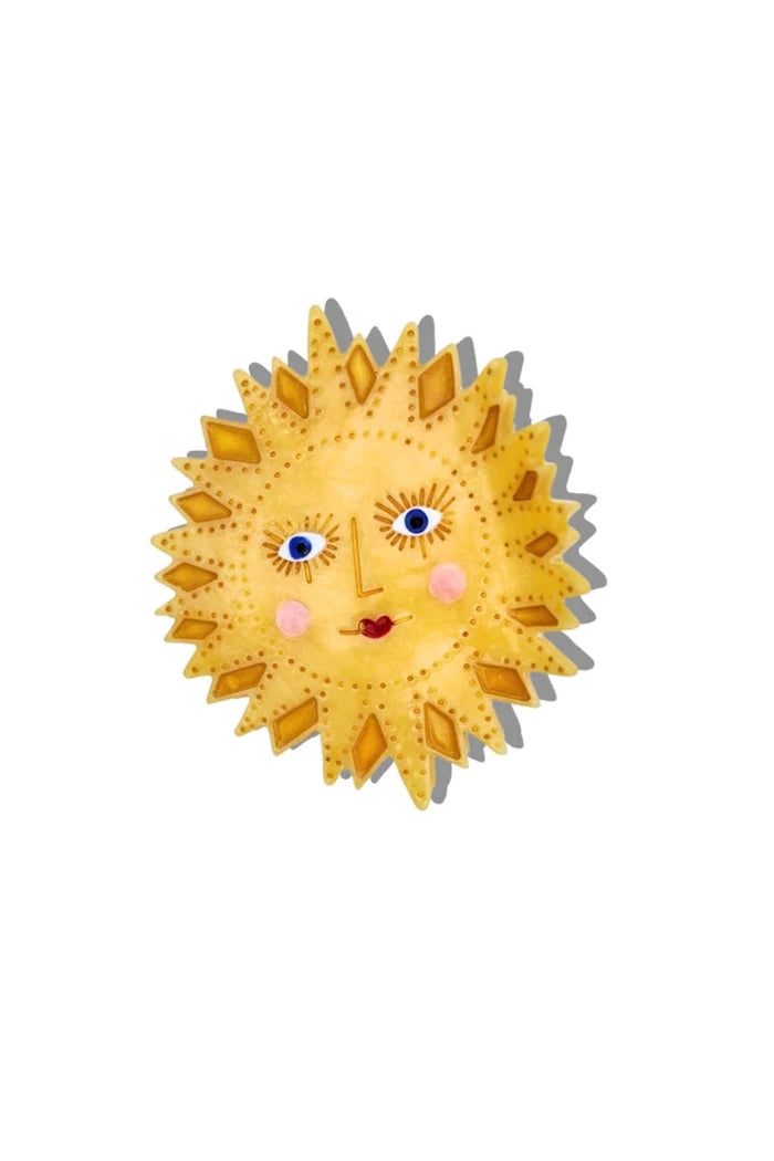 Sun shaped acetate hair claw clip with face design