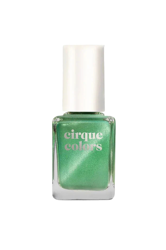 Green nail polish bottle with 'cirque colors' branding on a white background