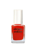 A bottle of red creme nail polish labeled 'Cirque Colors'.