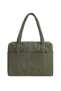 Green tote bag on white background