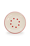 Cream enamelware plate with red rim and graphic tomato pattern.
