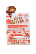 Box of Date Better peanut butter crunch on a white background with dates and peanuts.