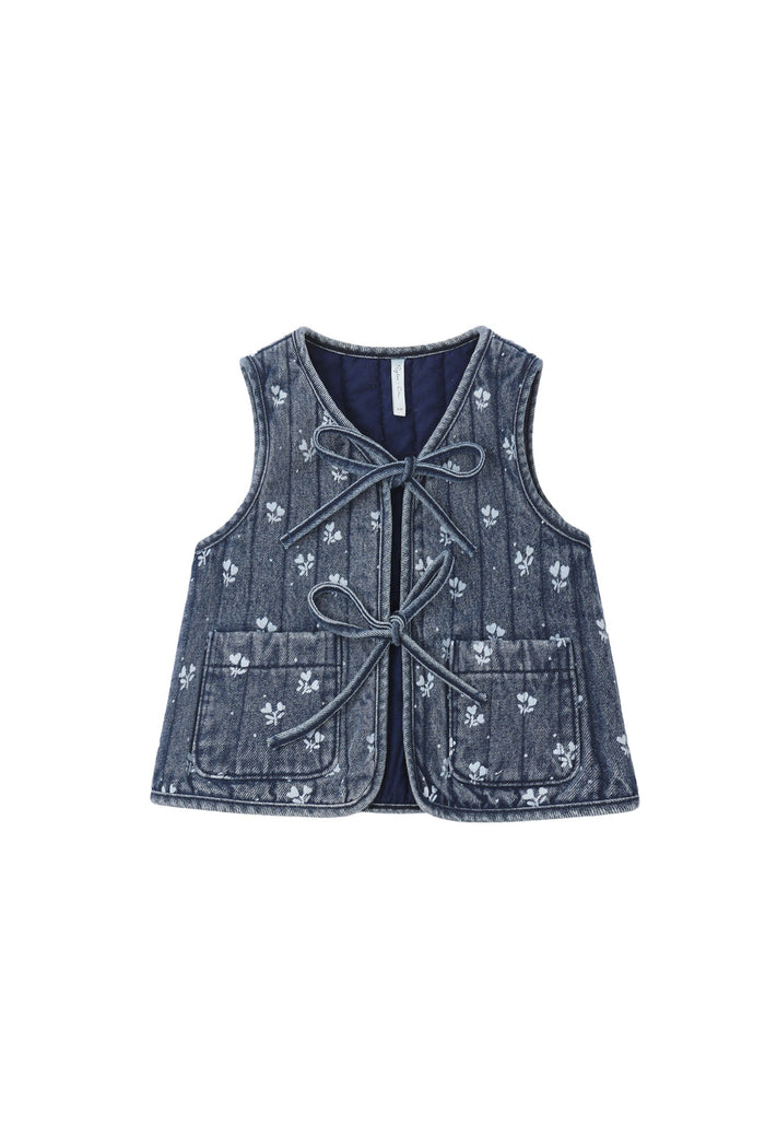 Quilted denim vest with bow closures and white ditsy pattern