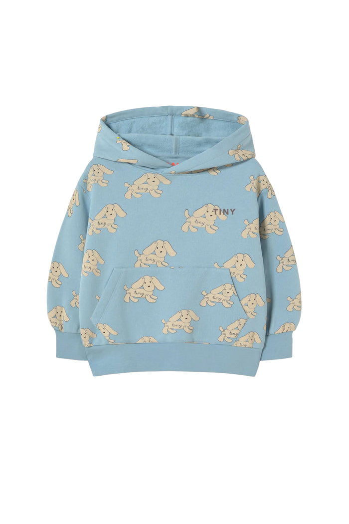 Blue hoodie with beige dog prints on a white background