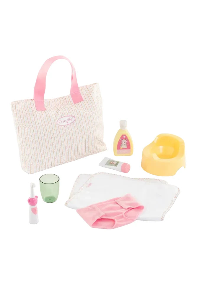 Collection of baby care items including a bag, bottle, and chair on a white background