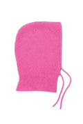 A bright pink knit bonnet with a ribbed cuff and two long drawstrings, photographed flat against a plain white background.