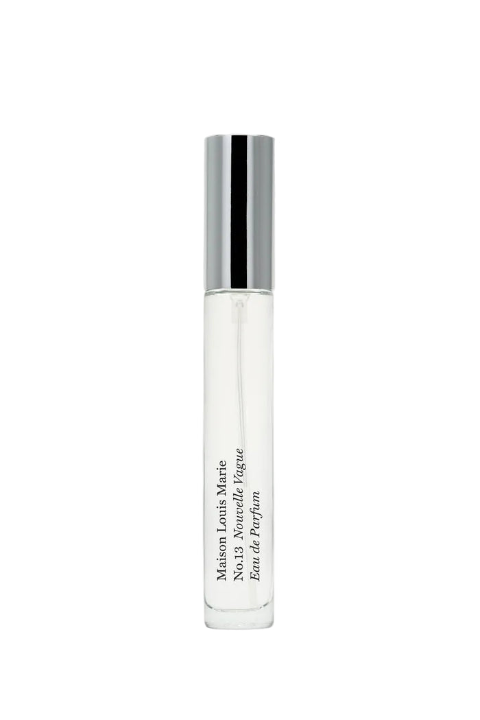 Perfume bottle with silver cap on a white background