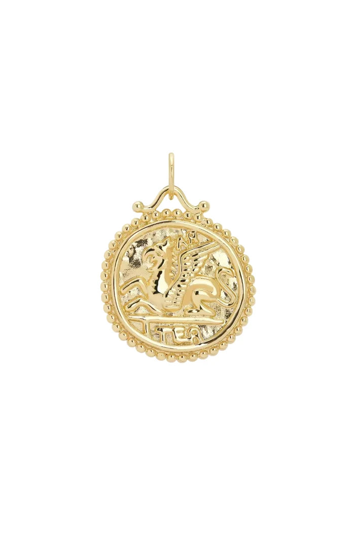 Gold pendant with a horse design on a white background