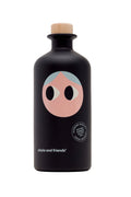 A 500 ml bottle of Greek extra virgin olive oil with a black label featuring a stylized graphic of an older woman's face, and the brand name 'yiayia and friends'.