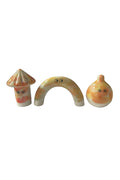 Various ceramic figurines with colorful glazes and faces
