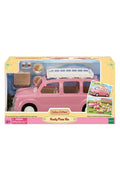 Colco Creations Family Picnic Van toy in its original packaging, featuring a pink van with a white roof rack and accessories inside a yellow and pink box.