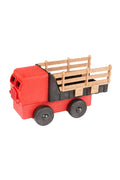Red toy truck with a brown bed on a white background