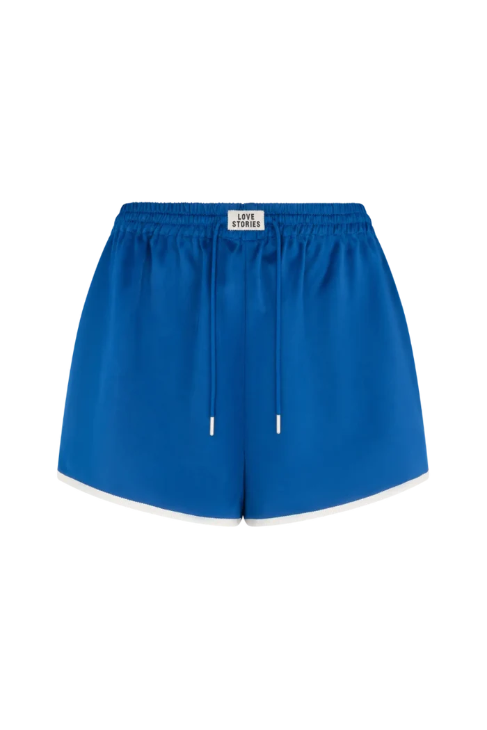 Blue shorts with a white label on a white background