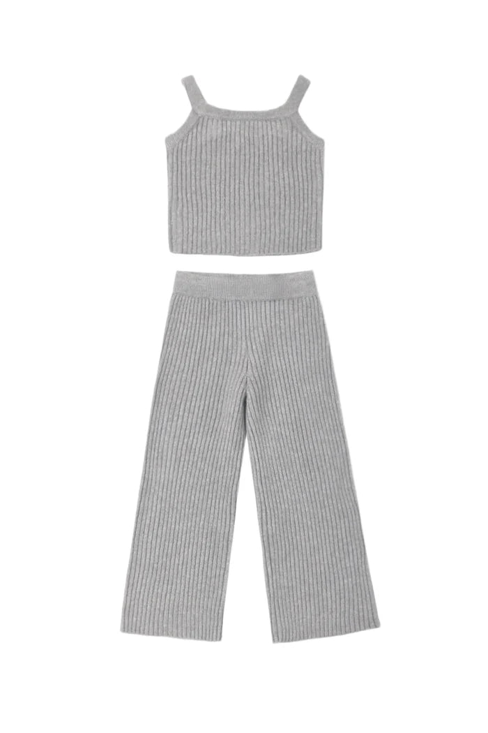 A two-piece children's outfit set featuring a sleeveless ribbed knit crop top and matching wide-leg cropped pants in a light gray and white vertical stripe pattern, displayed flat against a light gray background.