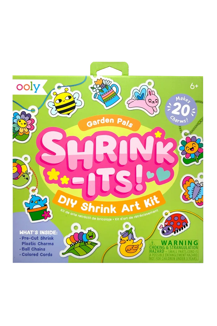 Shrink-Its DIY Shrink Art Kit packaging with colorful shrink charms on a green background