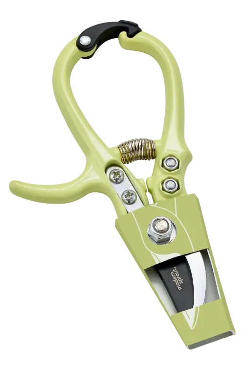Green garden pruner with a white background