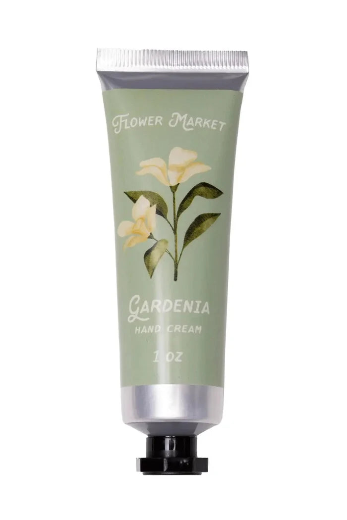 Hand cream tube labeled 'Gardenia' from 'Flower Market' on a white background