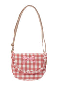 Pink checkered bag with a bow on a white background