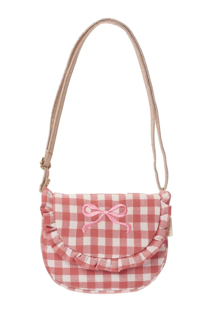 Pink checkered bag with a bow on a white background