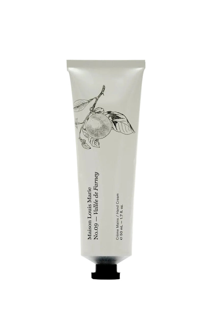 White tube of hand cream with black text and illustrations on a white background