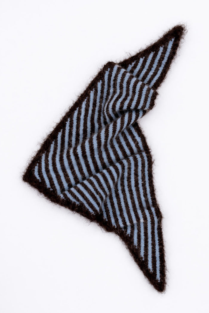 Brown and blue striped triangle scarf against white background