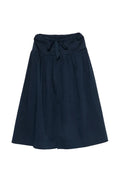 A dark navy blue A-line skirt with a gathered elastic waistband and a matching fabric drawstring, shown against a plain white background.