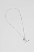 Silver necklace with a petal-shaped pendant and bar on a light gray background