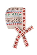 Knitted bonnet with pattern on a white background