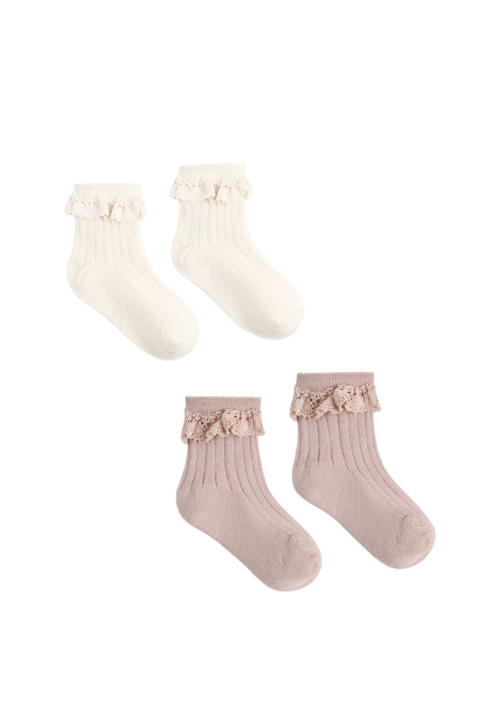 Two pairs of socks on a white background. One is cream and one is dusty pink, each with a lace trim.
