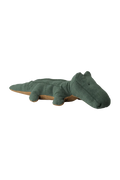 Green plush toy alligator on a white background
