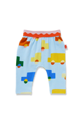 Light blue baby pants with a colorful geometric truck pattern, featuring an orange and pink elastic waistband, photographed on a white background.