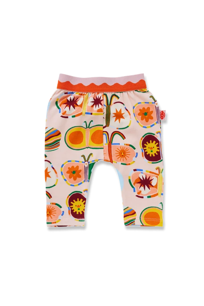 A pair of baby pants with a colorful butterfly.
