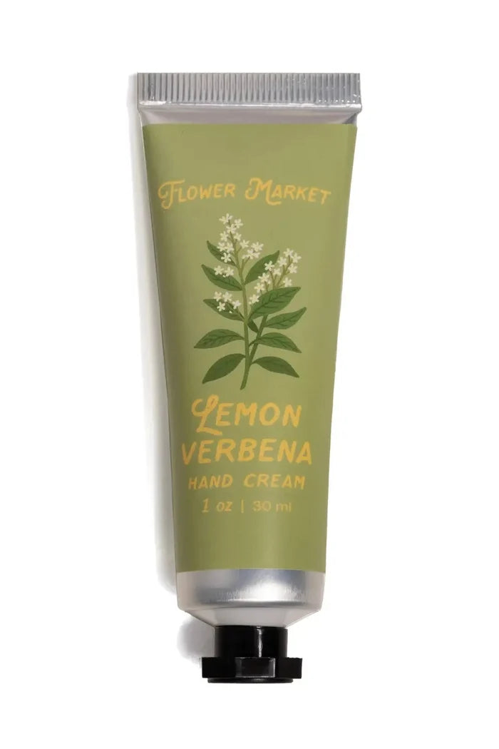 Green hand cream tube labeled 'Lemon Verbena' by 'Flower Market' on a white background