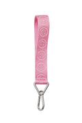 Pink strap with embroidered design and metal clip on a white background