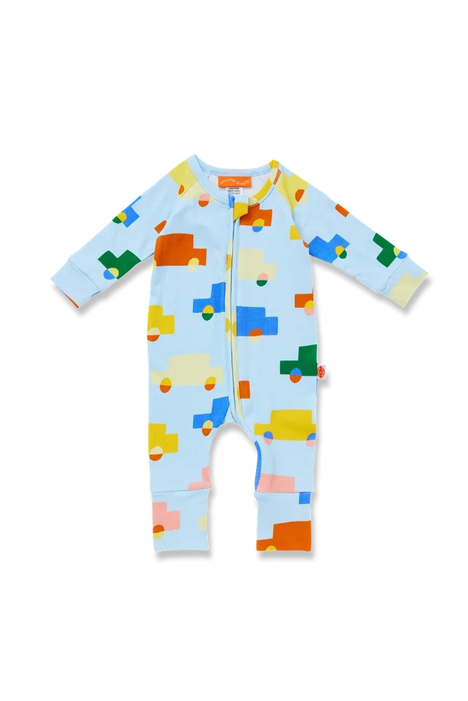 A baby long-sleeve footless one-piece romper in light blue, featuring a colorful geometric pattern of stylized cars and blocks in yellow, orange, green, blue, and pink. The romper has a front zipper and is photographed flat on a white background.