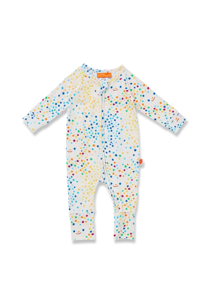A baby long-sleeve footless one-piece romper in white, decorated with a colorful pattern of small stars, smiley faces, and dots in multiple colors.