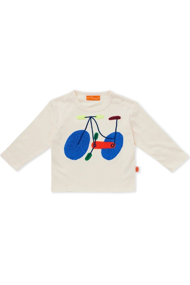 An off-white long-sleeve baby t-shirt featuring a colorful embroidered bicycle motif on the front, displayed flat against a solid white background.