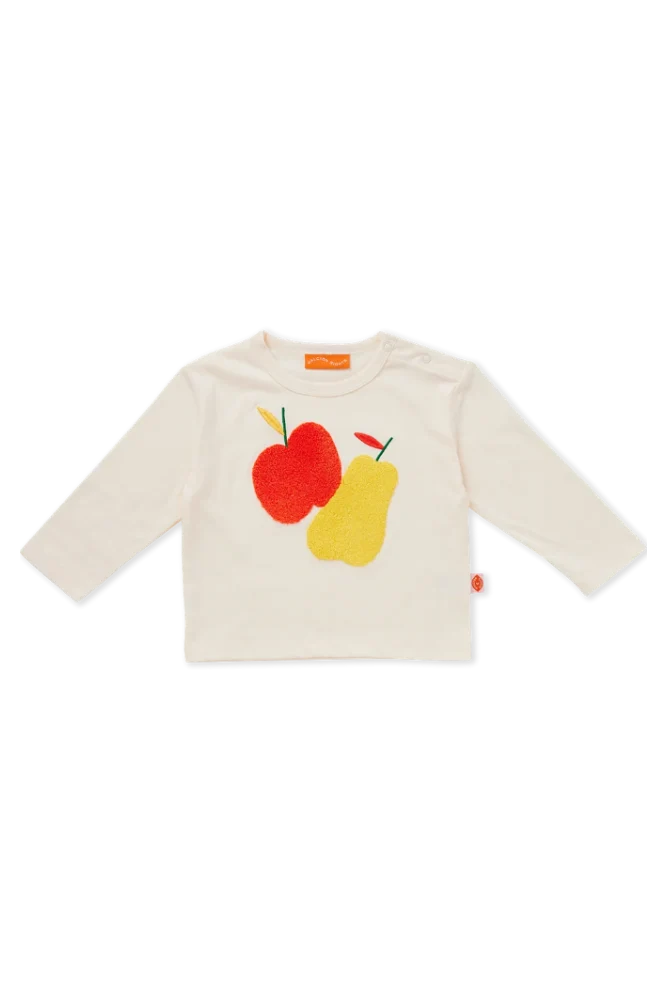 A cream-colored long-sleeve baby top featuring a textured applique design of a red apple and a yellow pear on the front, with a small orange brand label at the collar.